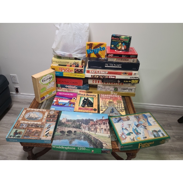 Variety of board games and puzzles, possible missing pieces
