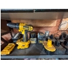 Image 1 : deWalt cordless drill with several DeWalt batteries and chargers

