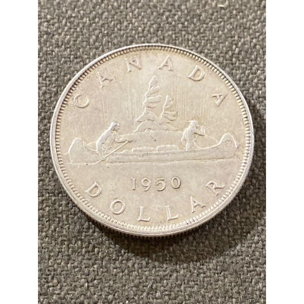 1950 Canadian Silver Dollar Featuring Voyageur Design