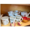 Image 5 : Collection of vintage Pyrex Opal Ware mugs featuring the "Spring Blossom Green" Crazy Daisey