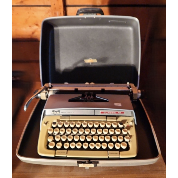 - Smith- Corona Classic 12 Typewriter w/ Case, Key Included