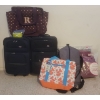 Image 1 : Two Small Luggage With Handles And Wheels
