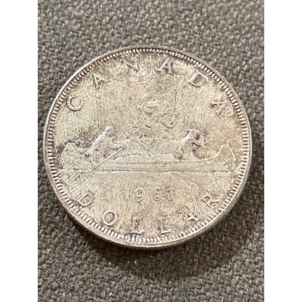 1961 Canadian Silver Dollar with Canoe Motif
