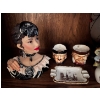 Image 3 : Collection of small face cups, little Webster, dictionary book lady statue small Mexican ashtray