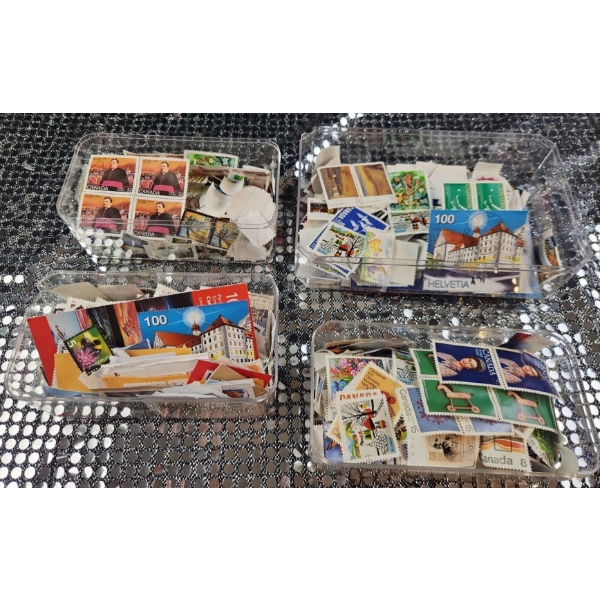 A Collection of Vintage Canadian Stamps Featuring Canadian Landmarks, Historical/Royal Figures 