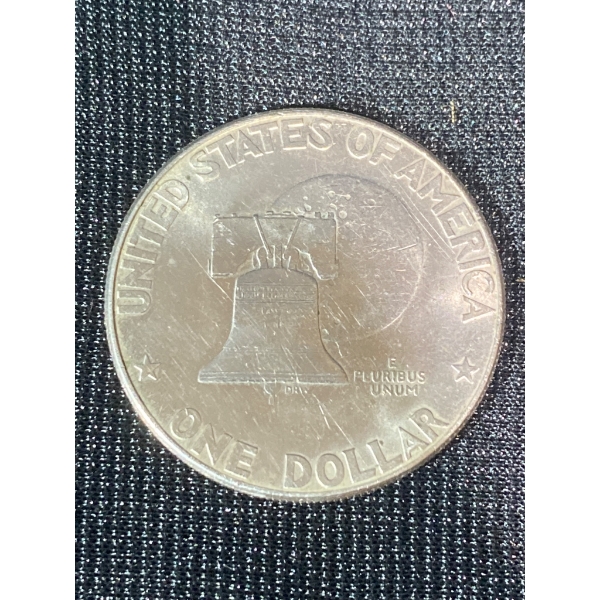 World Coins Featuring U.S. and Canadian Dollar Coins