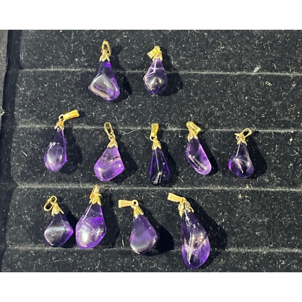 Collection of 11 Purple Stone Pendants