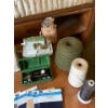 Image 4 : Vintage Portable Electric Sewing Machine with Leather Patches, Thread, and Accessories