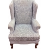 Image 1 : Upholstered Wingback Armchair with Carved Wooden Legs