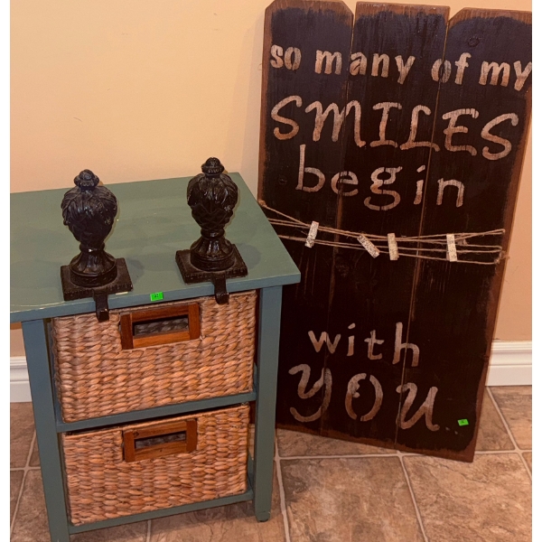 Decorative Lot: Wood Wall Sign, Wicker Drawer Stand, Cast Iron Finials