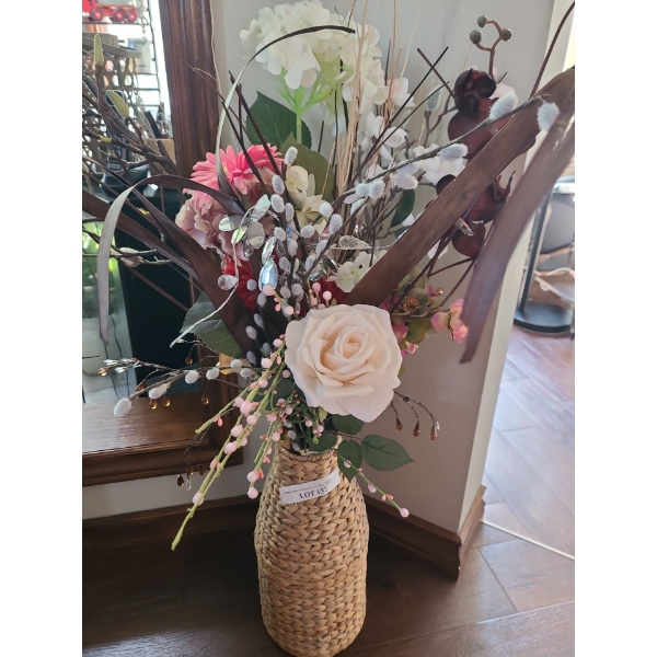 Silk Floral Arrangement in Straw Vase.  Vase 17 h and total height 44 h