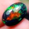 Image 1 : $3,735 Appraisal - 2.49 ct Cert. Black Opal Gemstone