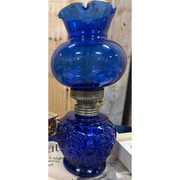 Vintage Items: Cobalt Glass Lamp, Camera, Eaton's Catalogue, and Ephemera