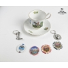 Image 1 : Royal Canadian Mounted Teacup & Saucer , a Boot keychain And Numbered Casino-Style Tokens. 