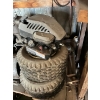 Image 2 :  Tires, lawnmower motors, jacks Bottom left shelf.