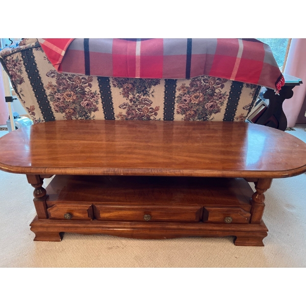 Solid oak coffee table in amazing Condition. 59 L 16 h 24w 
