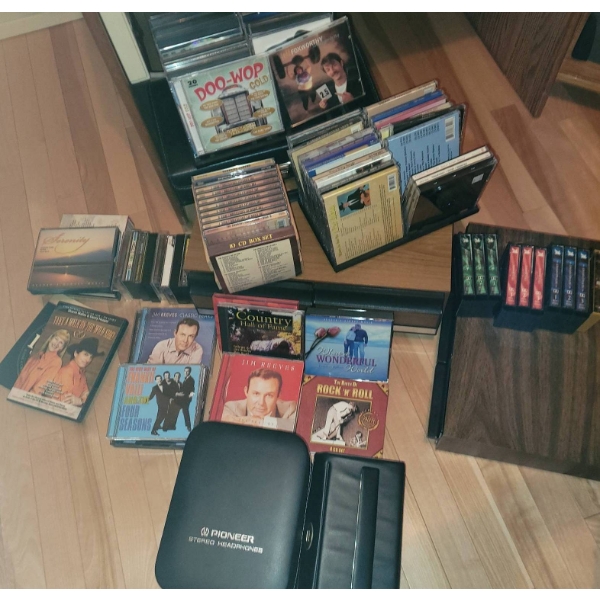 CDs, Cassette Tapes, and Box Sets Featuring Various Music Genres