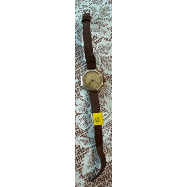 Watch with Brown Leather Strap (Centre tests like 10k Gold) 