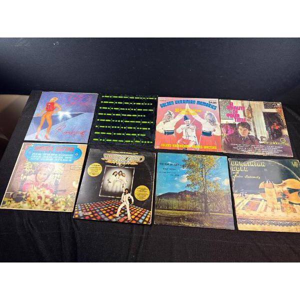 A pile of 8 various LPs