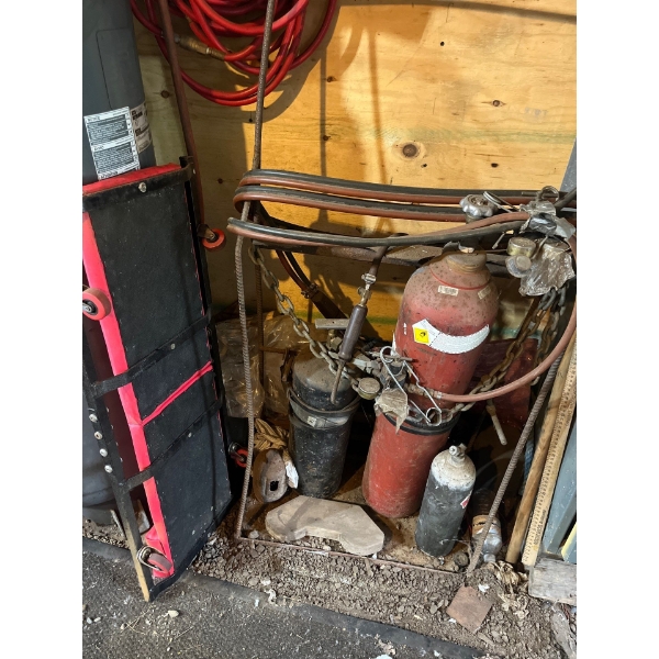 Oxygen acetylene tank with cart and cutter.
