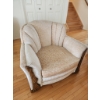 Image 1 : Vintage Upholstered Armchair With Rose-Embossed Pattern and Wooden Detailing