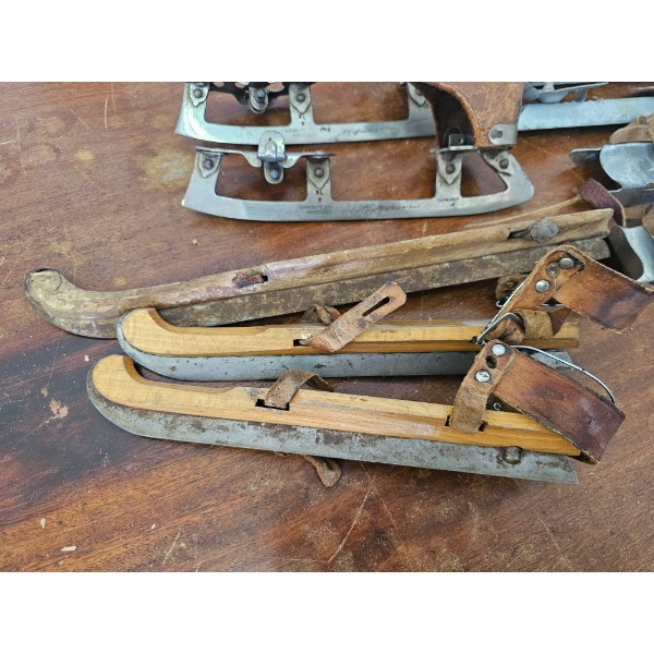 Vintage Ice Skates with Leather Straps and Wooden Components