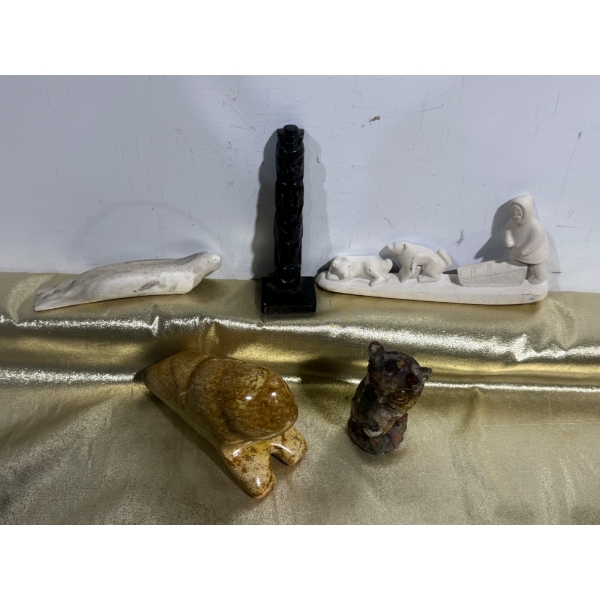 Five Carved Figures Including Stone and Resin Sculptures