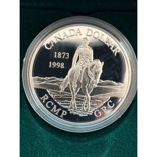 1998 $1 - Royal Canadian Mounted Police (RCMP), 125th Anniversary - B.U. Sterling Silver Dollar
TECH