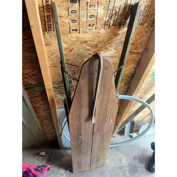 vintage ironing board and pry bar.