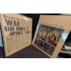 Image 1 : Framed Newspaper Pages Featuring Historic Headlines and Imagery