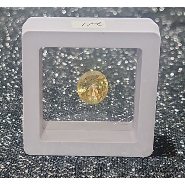 10.07 Carat Yellow Sapphire- Authentic with Certificate ( Estimated Value $9,000)