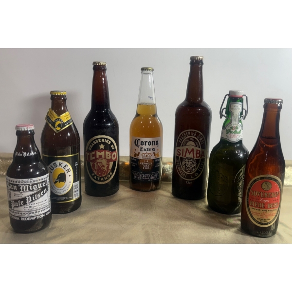 Seven Beer Bottles Including International Brands