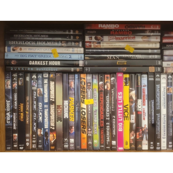 Row Of Collectible DvDs For the whole Fam Jam
