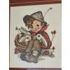 Image 4 : three framed cross-stitch embroideries featuring designs based on the artwork of M.I. Hummel. 