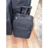 Image 4 : Four Black Softside Suitcases