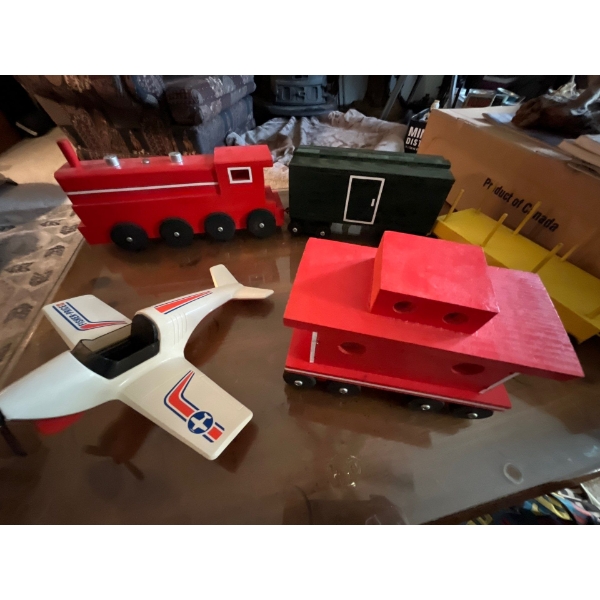 Antique Wooden Train set and vintage 1974 Fisher Pl. 306
Air plane.