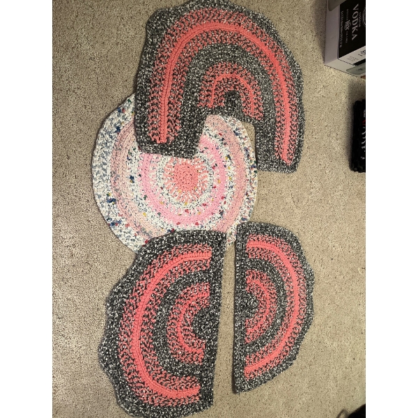crocheted rugs all handmade never been used for in total with three handmade hot pads. 