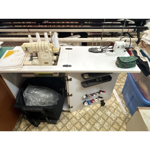 Evolve Baby lack Serger with stand all accessories, feet package all reference guides to Bob and spi