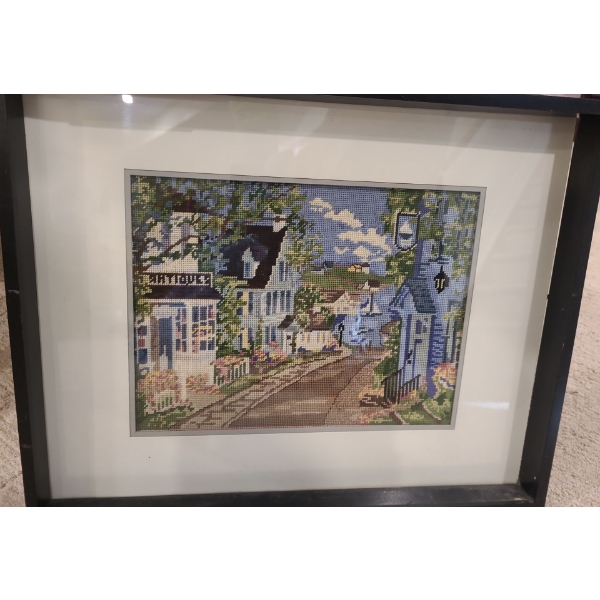 Framed Under Glass Needlepoint. Village Street w Antique Store 20 1/2 w 16 1/2 h