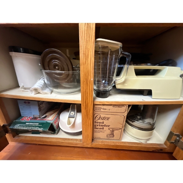 collection of vintage mixers, all contents of cupboard