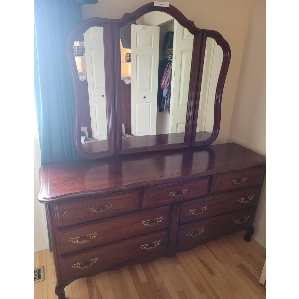 7-Drawer Wood Dresser with Pivoting Triple Panel Mirror and Brass Hardware