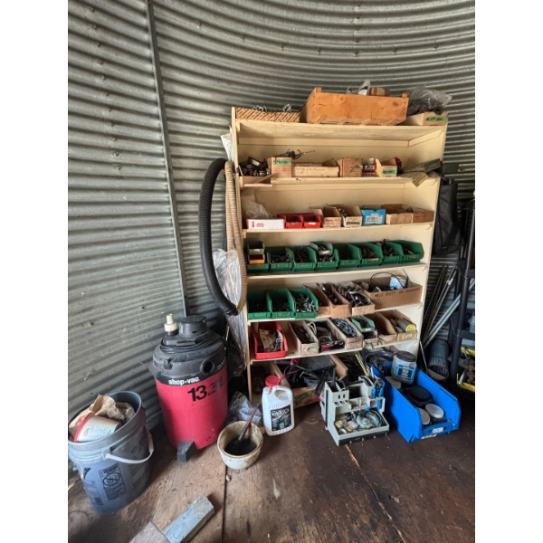  all contents of shell, including shelf and shop vac
