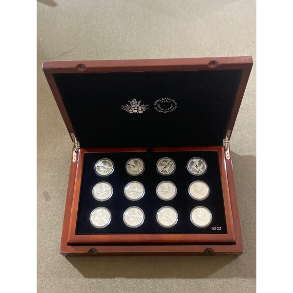 12 Canadian $50 Fine Silver Wildlife Proof Coins in Display Case, Royal Canadian Mint