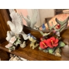 Image 2 :  collection of bird sculptures, soft, white, and pink in color