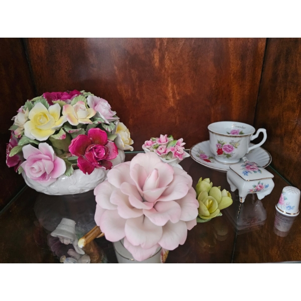 collection of porcelain or bone china floral figurines