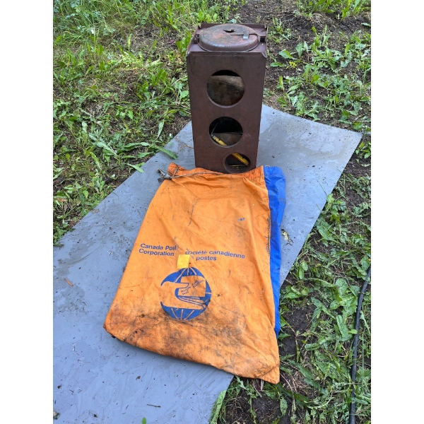 Wall tent, wood heater with vintage Canada post bag to carry it in