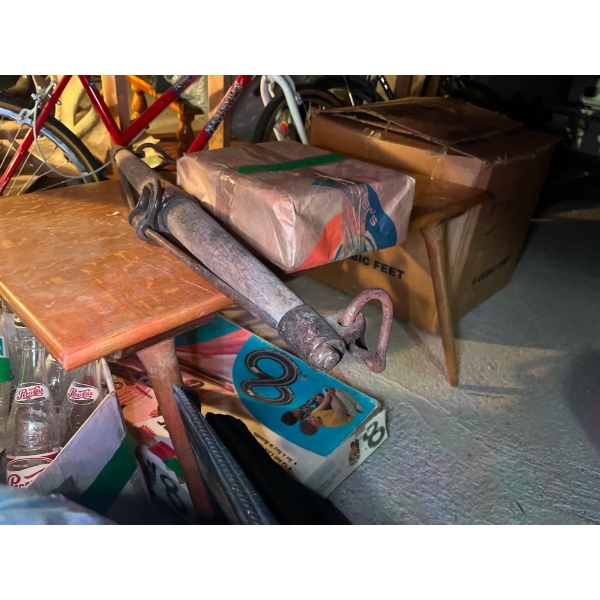  beautiful wood coffee table with antique horse pull, along with un researched magazines from 1951