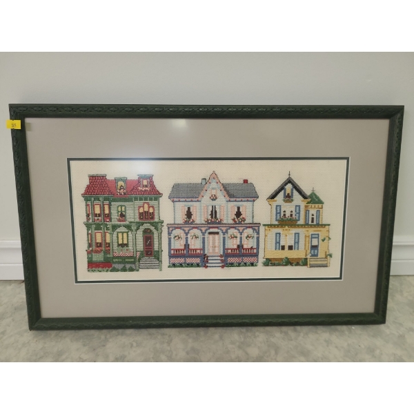 Framed cross- stitch of houses - 22W, 13T