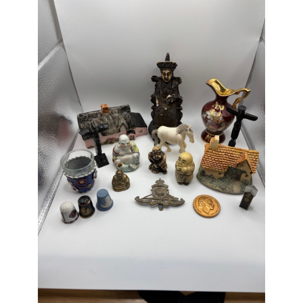 collection of small collectables Buddha’s pieces from all over the world, several different types of