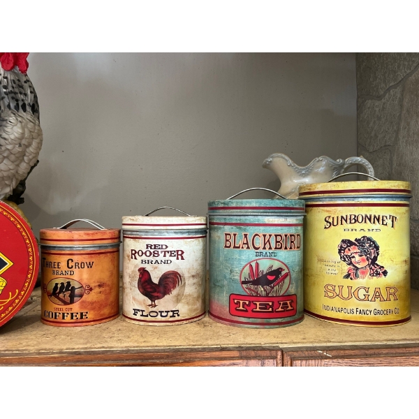 collection of tins with a Quaker oat vintage tin